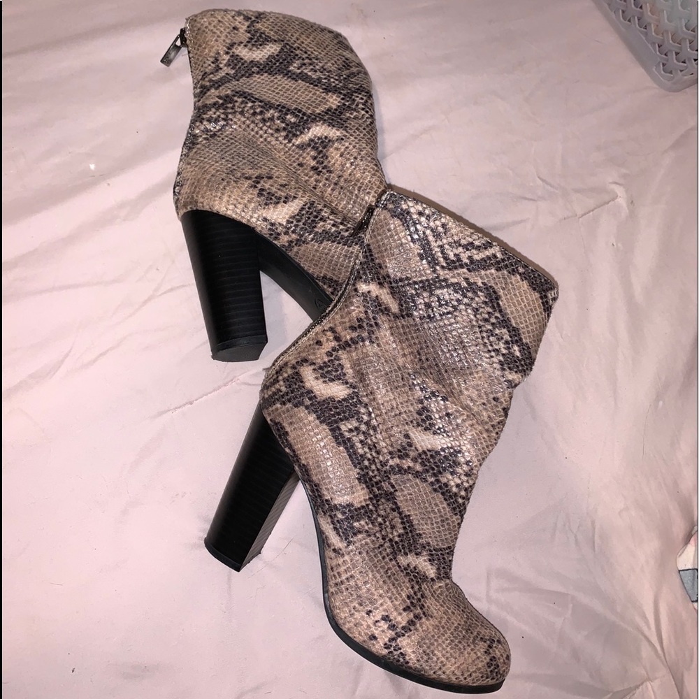 Snakeskin heeled boots